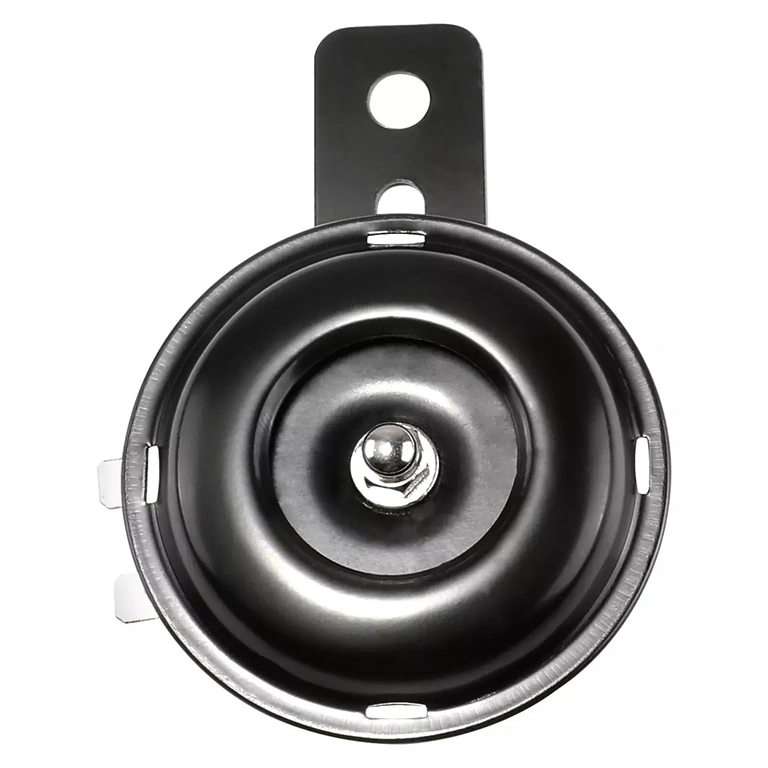 Klakson elektryczny zamontowany na kierownicy o natężeniu 105 decybeli